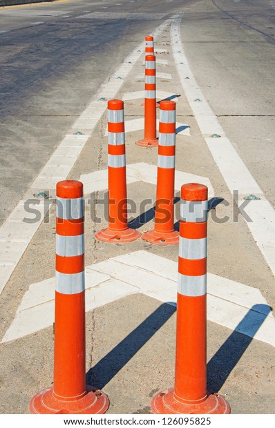 Orange Temporary\
Bollard for traffic\
safety.