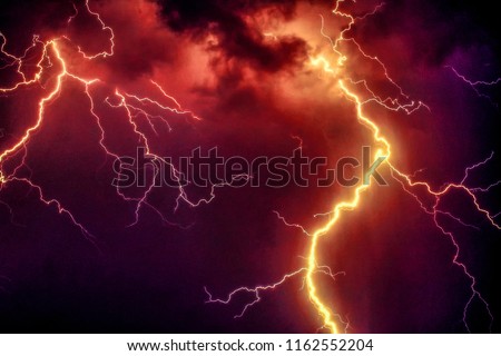 orange thunderstorm night sky