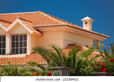 Orange Tiled Roof Of A Large House