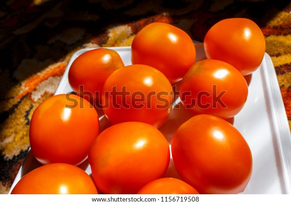 Download Orange Tomatoes On White Plastic Tray Stock Photo Edit Now 1156719508 PSD Mockup Templates