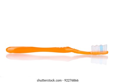 Orange Toothbrush Isolated On White