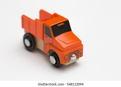 Orange Toy Car On A White Background