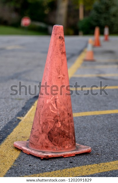 Orange Traffic Cones in\
No Parking Zone