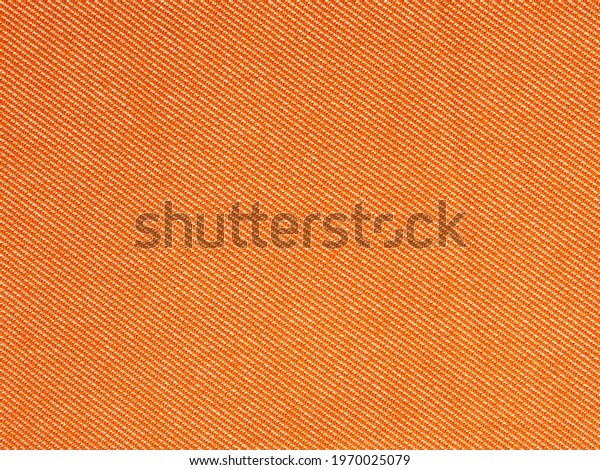 Orange twill textured\
plain fabric texture