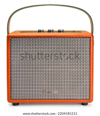 Orange Vintage style wireless speaker isolated on white background, Electric guitar amplifier speaker design on white With clipping path.