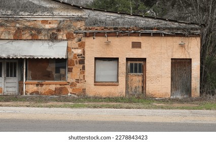 The orange wall of an abandoned shack in rural Texas 