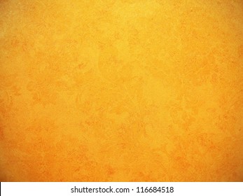 Orange Wallpaper With Rough Surface Texture.