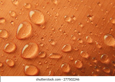 Orange waterproof textile background \ horizontal