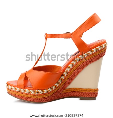 Orange women shoe isolated on white background.