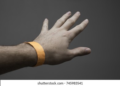 Orange Wristband For An Event Or The Hospital