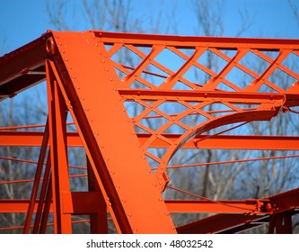Orange wrought iron bridge, left side detail