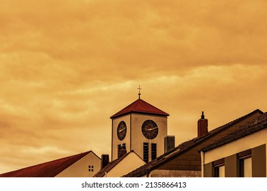 Orange Yellow Clouds Over The Roofs Of Augsburg City During Sahara Dust Storm