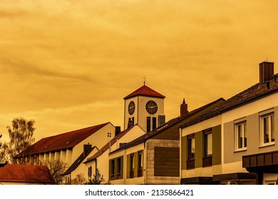 Orange Yellow Clouds Over The Roofs Of Augsburg City During Sahara Dust Storm