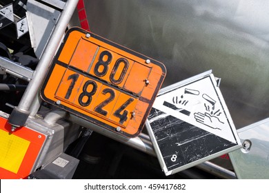 Orange-colored Plate With Hazard-identification Number 80 And UN-Number 1824 (sodium Hydroxide Solution)