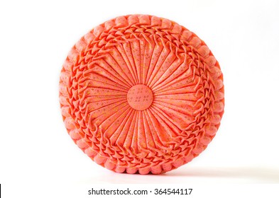 Orange-red Round Pillow On Withe Background