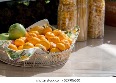 Oranges in basket on table selective focus