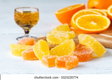 oranges with brandy on table