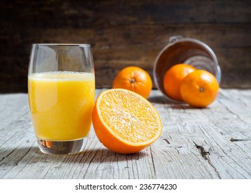 Oranges isolated cut set on wooden base