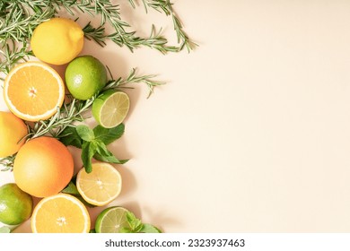 Oranges, lemons, lime, rosemary and mint, citrus fruits on a beige background, palm leaf shadow. Summer party concept. Trendy palm leaf shadow and sunlight - Shutterstock ID 2323937463