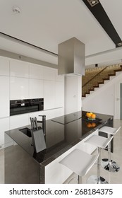 Oranges On Granite Worktop In Modern Kitchen