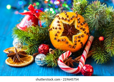 Oranges pierced with cloves,Christmas spices and nuts - Powered by Shutterstock