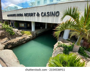 Oranjestad, Aruba -2022: Renaissance Aruba Resort and Casino. Canal flowing through the ground level of hotel provides access for water taxi to private island.