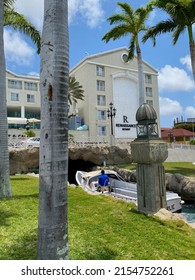 Oranjestad, Aruba -2022: Renaissance Aruba Resort and Casino. Canal flowing through the ground level of hotel provides access for water taxi to private island.