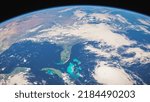 Orbital view of Florida and USA looking down from space, showing the Everglades, Florida Keys, Gulf of Mexico, Hurricane forming