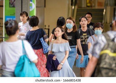 Orchard Road, Singapore Mar 07/2020 Some Of People Are Wearing Medical Mask When They Walk On The Orchard Street During Covid 19 Outbreak