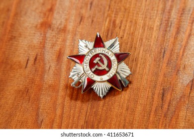 Order of the Patriotic War in St. on a wooden. Close up