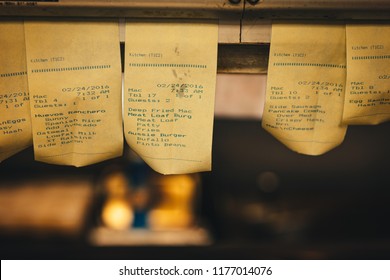 Order Tickets Hanging In The Kitchen Of A Vintage Diner