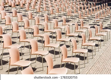 Ordered Chairs Pattern For Outdoor Event With Security Measures