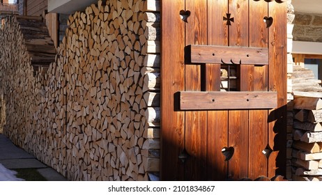 an orderliness woodshed in the Aosta valley - Shutterstock ID 2101834867