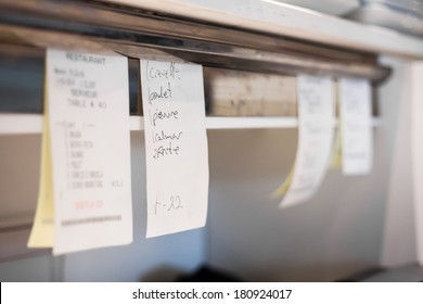 Orders in a Portuguese Restaurant Kitchen - Powered by Shutterstock