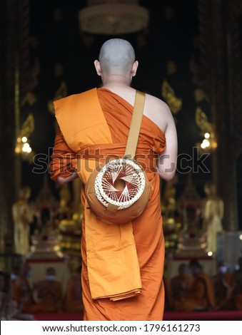 Ordination ceremony A young Thai man ordained as a monk at the age of 20 in Bangkok, Thailand.