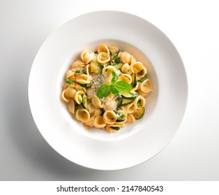Orecchiette with zucchini in white plate above. - Shutterstock ID 2147840543