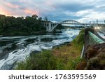 The Oregon City Bridge, also known as the Arch Bridge, is a steel through arch bridge spanning the Willamette River between Oregon City and West Linn, Oregon, USA