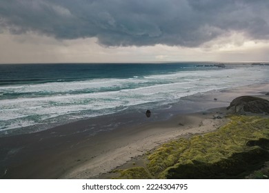 Oregon Coast Beach With Storm Clouds, Fall Winter Season. 