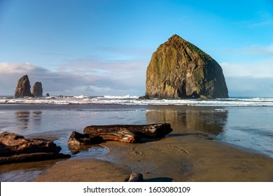 Oregon Coast Beach - Stunning winter landscape with famous cannon beach haystack mingle with driftwood ,  Oregon USA.