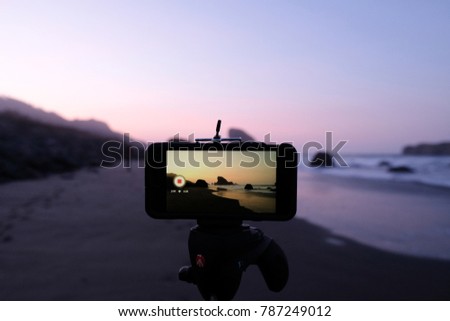 Oregon Coast Sunset as seen through an smart phone on a tripod.