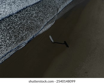 Oregon coast surfer entering ocean  - Powered by Shutterstock