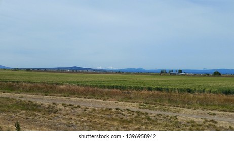 Oregon High Desert Mountain Range And Farm