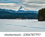 Oregon mountain peak named Mt. Thielsen in Cascade mountain range, winter view from Lemolo lake in the Umpqua National forest