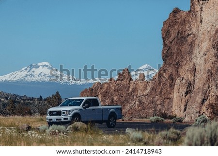 Oregon, USA - June 28, 2020: Big truck against the backdrop of mountains and rocks