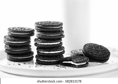 Oreo chocolate cookies stacked with milk - Powered by Shutterstock