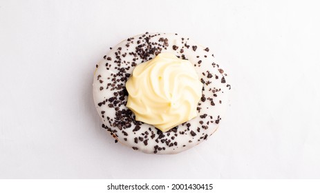 Oreo Cookie Creme Tart Donut On A White Background Top View From Above