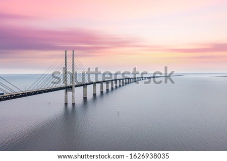 The Oresund bridge between Copenhagen Denmark and Malmo Sweden when sunset in an evening of May