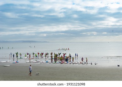 Orewa, New Zealand - February 19 2021; Group Youth On Saturday Morning At Beach For Surf Lifesaving Training