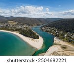 Orford, Tasmania: Aerial drone view of the Orford town by the Tasman sea and the Prosser river and bay in Australia.