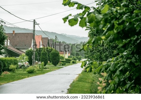 Orfu or Orfű village near Pecs or Pécs in Hungary is typical countryside and rural life during summer after the rain with meadows, tranquil and peaceful streets, and wildflowers.